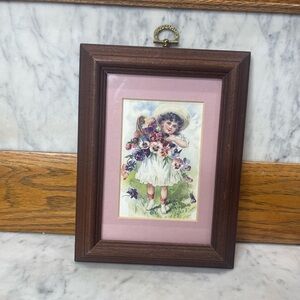 vintage framed print featuring a young girl in a Victorian style